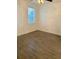This cozy bedroom is lit with a natural light from a single window at 3468 Soho St # 107, Orlando, FL 32835
