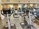 Community gym with various exercise equipment including treadmills and stationary bikes at 3468 Soho St # 107, Orlando, FL 32835
