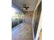 A relaxing screened lanai offers an excellent view and features a ceiling fan at 3468 Soho St # 107, Orlando, FL 32835