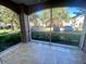 Screened lanai features tile flooring, offering a relaxing outdoor space at 3468 Soho St # 107, Orlando, FL 32835