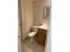 Clean bathroom with tiled floors and wood vanity at 6008 Village Cir # Ge, Orlando, FL 32822