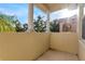 Private balcony with view of lush green trees at 8547 Leatherleaf Ln, Orlando, FL 32827