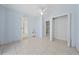 Spacious bedroom with tile floors and a large closet at 357 Lariat Ln, Kissimmee, FL 34743