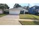 One-story house with attached garage and well-manicured lawn at 105 Fern Springs St, Debary, FL 32713