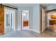 Main bathroom with double sinks and kitchen access at 171 Pheasant Dr, Haines City, FL 33844