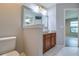 Bathroom with single vanity and walk in shower at 171 Pheasant Dr, Haines City, FL 33844
