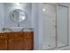 Bathroom with vanity, large mirror, and shower at 171 Pheasant Dr, Haines City, FL 33844