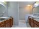 Double vanity bathroom with granite countertop at 171 Pheasant Dr, Haines City, FL 33844