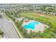 Aerial view of community pool, playground, and common areas at 171 Pheasant Dr, Haines City, FL 33844