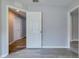 Clean hallway with wood-look floors and neutral walls at 171 Pheasant Dr, Haines City, FL 33844