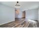 Living room with wood-look floors and neutral wall colors at 171 Pheasant Dr, Haines City, FL 33844
