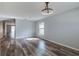 Living room with wood-look floors and neutral wall colors at 171 Pheasant Dr, Haines City, FL 33844