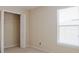 Cozy bedroom with closet, carpet, and a bright window at 2142 Brandywine Falls Way, Orlando, FL 32824