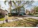 Charming home featuring mature landscaping, well kept lawn, and a two-car garage at 2142 Brandywine Falls Way, Orlando, FL 32824