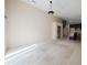 Open living area with vaulted ceilings, ceiling fan and easy access to the kitchen at 2142 Brandywine Falls Way, Orlando, FL 32824