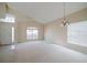 Inviting living area with lots of natural light and high ceilings creating an airy atmosphere at 2142 Brandywine Falls Way, Orlando, FL 32824