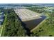 Aerial view of the community including a pond and green space at 1165 Basalt Ln, Sanford, FL 32771