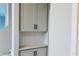 Stylish storage nook with upper and lower cabinets, perfect for organization and display at 1165 Basalt Ln, Sanford, FL 32771
