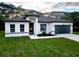 Charming single-story home boasts a well-manicured lawn and a two-car garage at 17126 Sw 42Nd Ter, Ocala, FL 34473
