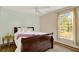 Bedroom with double bed and large window at 1007 Tony Cir, St Cloud, FL 34772