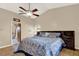 Large bedroom with a king-size bed and access to the bathroom at 1007 Tony Cir, St Cloud, FL 34772