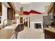 Bright kitchen with dark wood cabinets and granite countertops at 1007 Tony Cir, St Cloud, FL 34772