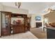 Living room features wood-look floors and a built-in bar at 1007 Tony Cir, St Cloud, FL 34772