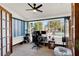 Home office with pool view and plenty of natural light at 1007 Tony Cir, St Cloud, FL 34772