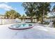 Community hot tub and surrounding lounge chairs at 7900 S Orange Blossom Trl # 2097, Orlando, FL 32809