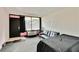 Living room with a bed, couch, and access to a balcony at 7900 S Orange Blossom Trl # 2097, Orlando, FL 32809