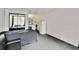 Studio apartment with kitchenette, bed, and sofa at 7900 S Orange Blossom Trl # 2097, Orlando, FL 32809