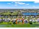 Aerial view of single Gathering home and community at 103 Old Sunbeam Dr, South Daytona, FL 32119