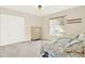 Bedroom with double bed and built-in shelving at 103 Old Sunbeam Dr, South Daytona, FL 32119