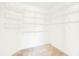 Walk-in closet with wire shelving at 103 Old Sunbeam Dr, South Daytona, FL 32119