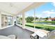 Bright Florida room with water views and sliding doors at 103 Old Sunbeam Dr, South Daytona, FL 32119
