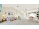 Living room with vaulted ceiling and neutral decor at 103 Old Sunbeam Dr, South Daytona, FL 32119