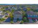 Aerial view of a well-maintained two-story home nestled in a charming residential neighborhood at 14046 Walcott Ave, Orlando, FL 32827