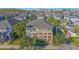 Aerial view of a beautiful home surrounded by lush landscaping and a vibrant community at 14046 Walcott Ave, Orlando, FL 32827