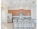Beautiful Kitchen with granite countertops, stainless steel appliances, and an island with bar seating at 14046 Walcott Ave, Orlando, FL 32827