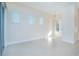 Bright, open living area with large windows and a door leading to the outside at 14046 Walcott Ave, Orlando, FL 32827