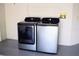 Convenient laundry room with modern washer and dryer at 1575 Guinevere Dr, Casselberry, FL 32707