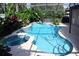 Relaxing pool area with spa and lush landscaping at 1575 Guinevere Dr, Casselberry, FL 32707