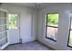 Sunroom with access to backyard and additional windows at 1575 Guinevere Dr, Casselberry, FL 32707