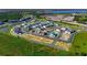 Aerial view of new homes under construction near water at 434 Belmond Dr, Debary, FL 32713
