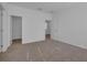 Bright bedroom with neutral wall colors and carpet at 434 Belmond Dr, Debary, FL 32713