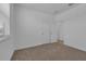 Spacious bedroom with neutral carpeting and doors at 434 Belmond Dr, Debary, FL 32713