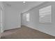 Spacious bedroom with neutral carpeting and large windows at 434 Belmond Dr, Debary, FL 32713