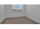 Simple bedroom with neutral wall paint and carpeted floor at 434 Belmond Dr, Debary, FL 32713