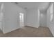 Bright hallway with access to bedrooms and stairs at 434 Belmond Dr, Debary, FL 32713