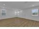 Bright and airy living room with hardwood floors and recessed lighting at 434 Belmond Dr, Debary, FL 32713